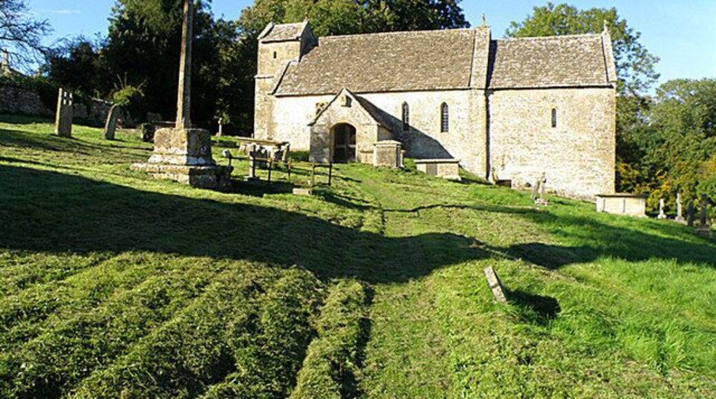 St Michael's Church, Duntisbourne Rouse This church comes complete with a saxon nave and a 14th century cross with its original mutilated head. I'm assuming the cross can be seen on the left.