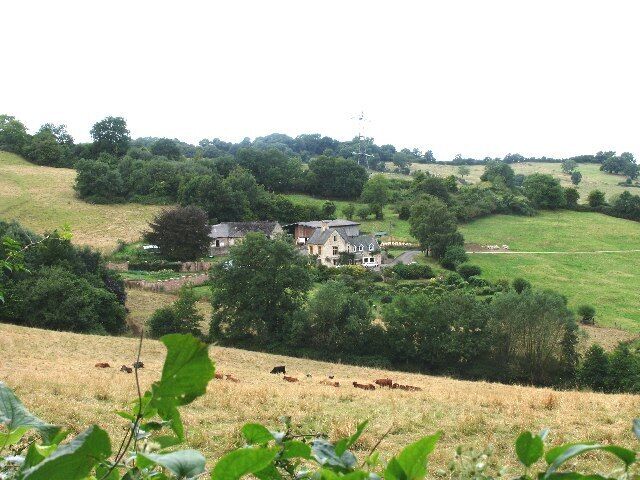 Old Dole Farm. Hidden away in a fold of the hill above the A40 and reached by a winding track, this farm is clearly visible from the Cotswold way.