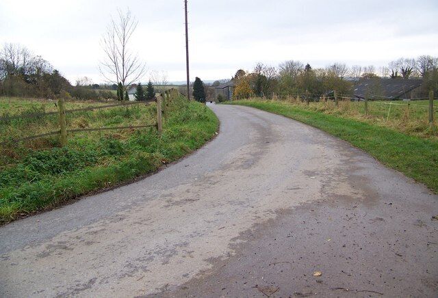 Drive to Dean Hill Farm The byway now becomes metalled.
