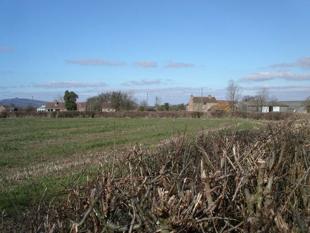 Farleys End Gloucestershire. The small village of Farleys End lies close to the river Severn. In the background to the left at a distance of 10 kilometres is May Hill and Newent Woods.