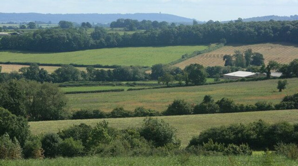 South from Chickwell Lane Looking over fields Hardington Farm is just in the frame to the right. On the distant horizon at the end of the hill we can see Alfred's Tower, this is in Grid Square ST7435, we are in Grid Square ST7453, from this we know Alfred's Tower is approximately 17 kilometres due south.