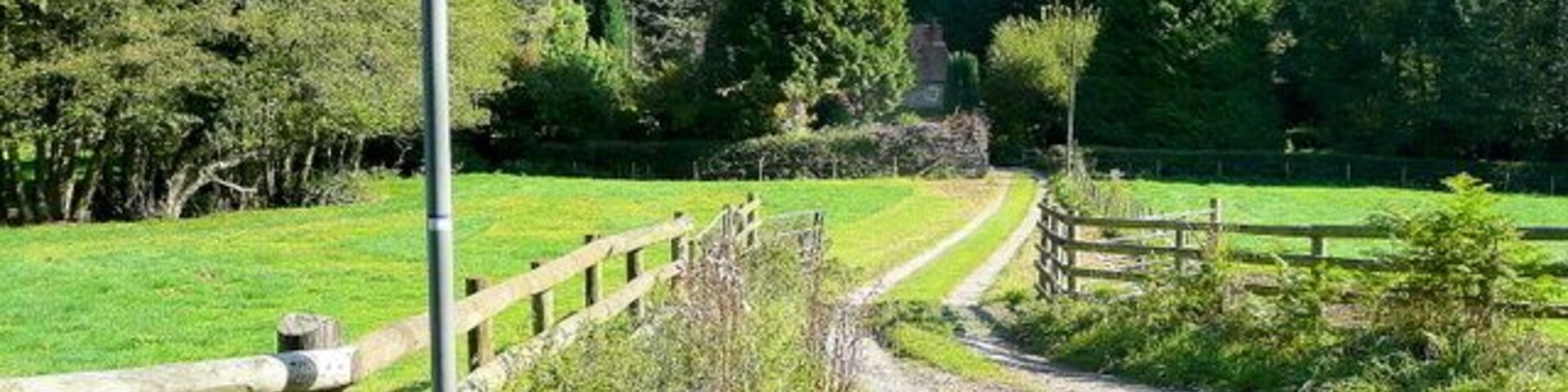 Footpaths in the Flaxley Valley 2 Looking north east along the footpath line past an idyllically situated house.