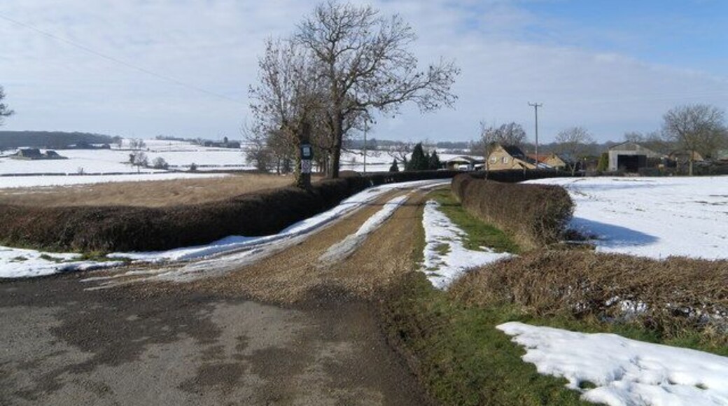 Oakland's, Caldecote A farm with a caravan and camping field adjacent to the farmyard.
