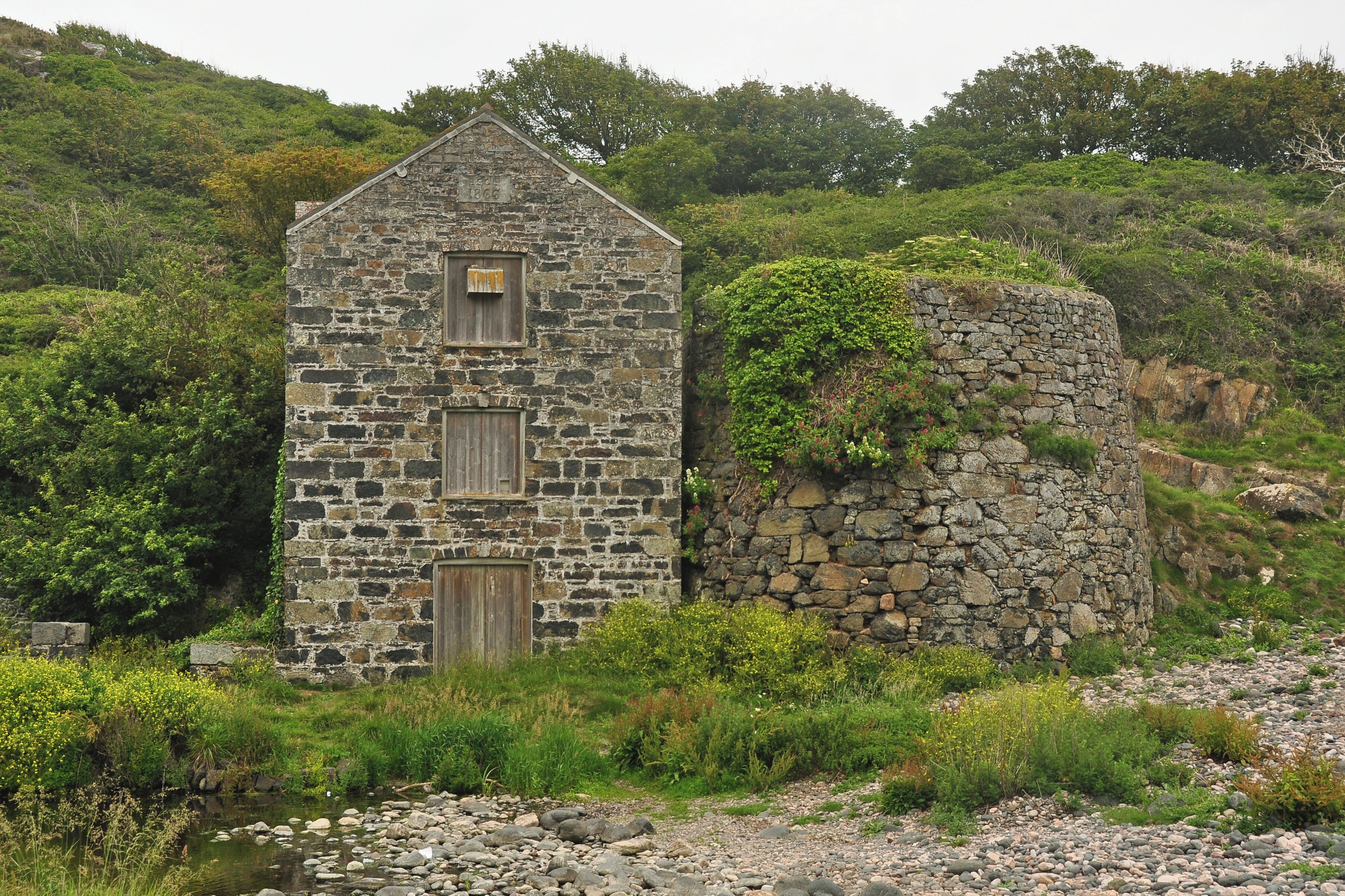 The ruined serpentine factory on the beach at Poltesco, near Cadgwith in southern Cornwall.