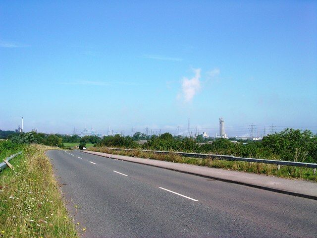 View NW to Industrial Sites by the Severn Photo taken from motorway bridge facing NW along the minor road leading to a series of industrial sites - from left to right Philblack works, Seabank gasworks and Severnside works