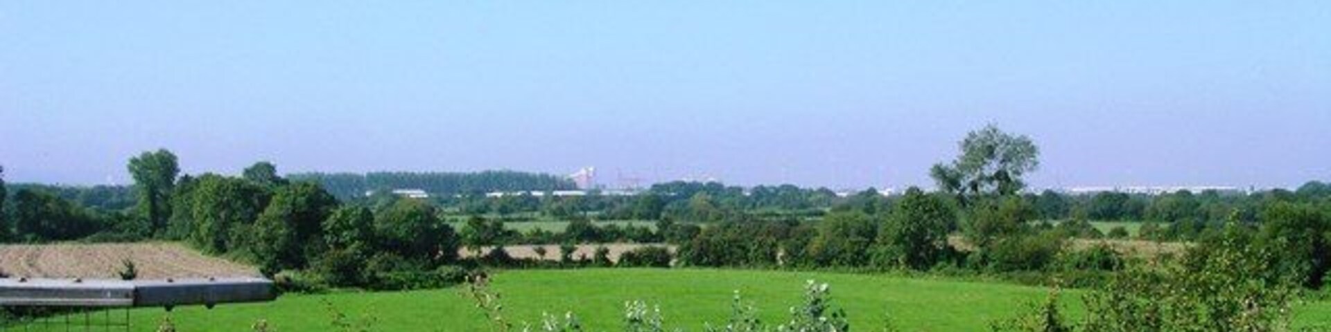 Avonmouth from motorway bridge near Hallen Another view from the motorway bridge across fields towards Avonmouth and Royal Portbury Docks