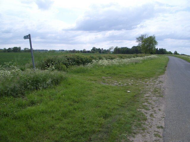Footpath to Salome Farm from the Hamerton Road The footpath heads in a southerly direction towards Salome Farm and the road leads to Hamerton which is less than half a mile away where the church is visible in this view.