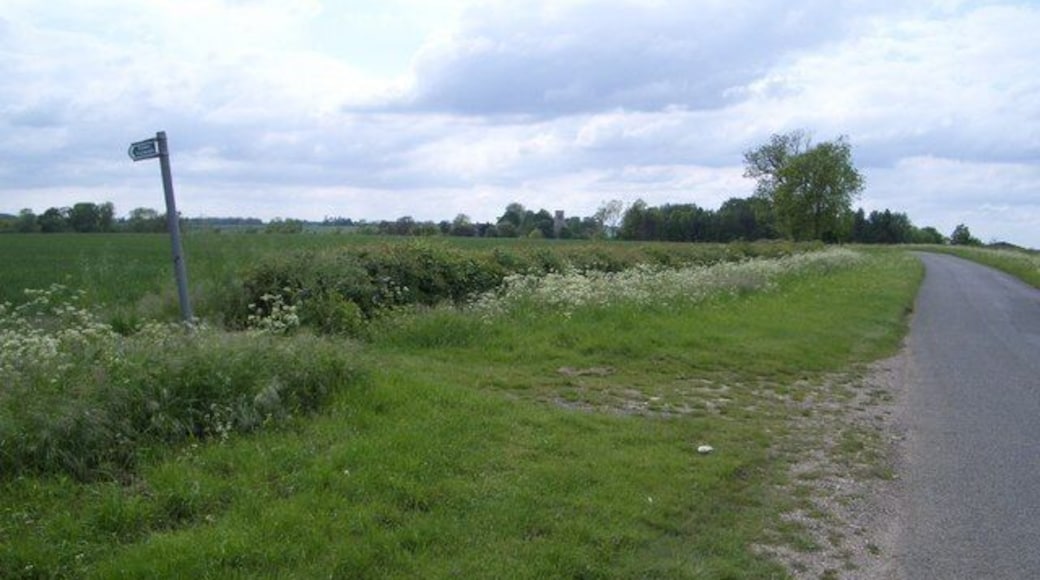 Footpath to Salome Farm from the Hamerton Road The footpath heads in a southerly direction towards Salome Farm and the road leads to Hamerton which is less than half a mile away where the church is visible in this view.