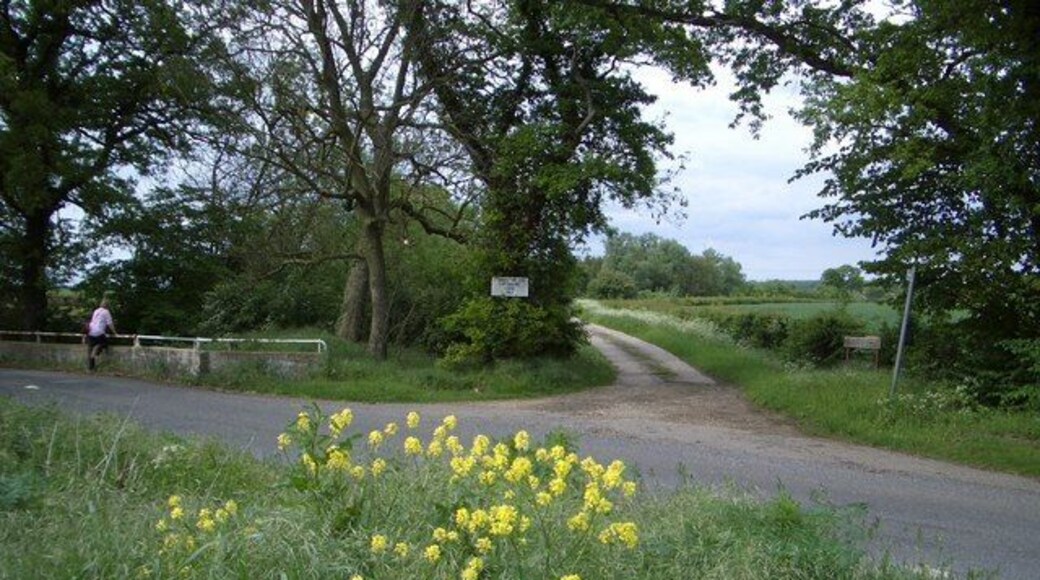 Mile Brook Bridge & Bridleway West of Upton Mile Brook Bridge, probably named after the distance from Hamerton to the west, crosses the Alconbury Brook to the left of this view. The farm track ahead is also a public bridleway to Coppingford Lodge and the Bullock Road beyond, the latter a former cattle drover's trackway.
