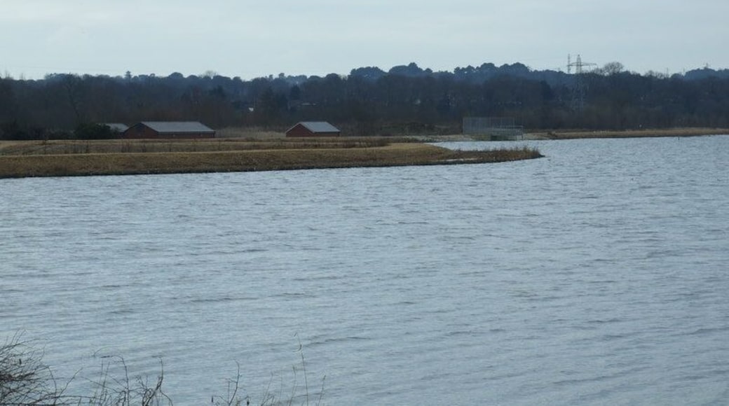 Longham Lake The southerly of the two reservoirs, that provides an average of 7 days water storage for the Bournemouth area. This reservoir has only just recently been filled, previously it was a sand and gravel pit. The surrounding area is still being landscaped. The buildings are part of the pumping facilities.