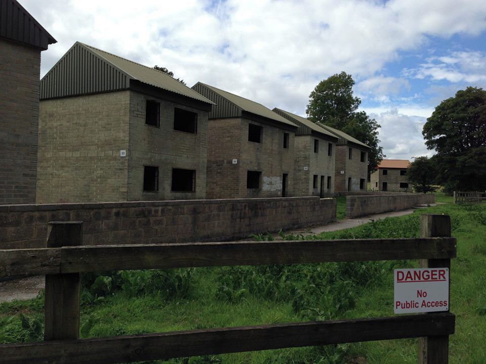 This is a tiny village that is now part of a military training ground and can only be accessed a few times a year.  It was evacuated in WW2 with the promise that the residents could go back after the war and when the military were finished using it, they were never allowed back. Most of the original village is gone but these are the 'houses' the military now use for training exercises #lifeatexpedia