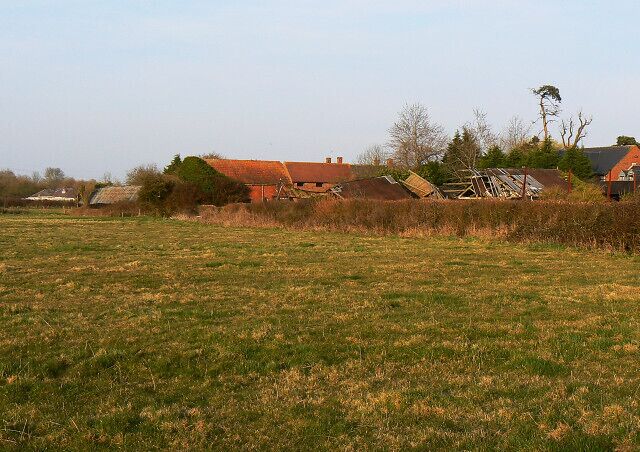 Farm buildings, near Coped Hall The farm appears on large scale maps as 'The Marsh Farm'. Parts of it look just a tad run down.