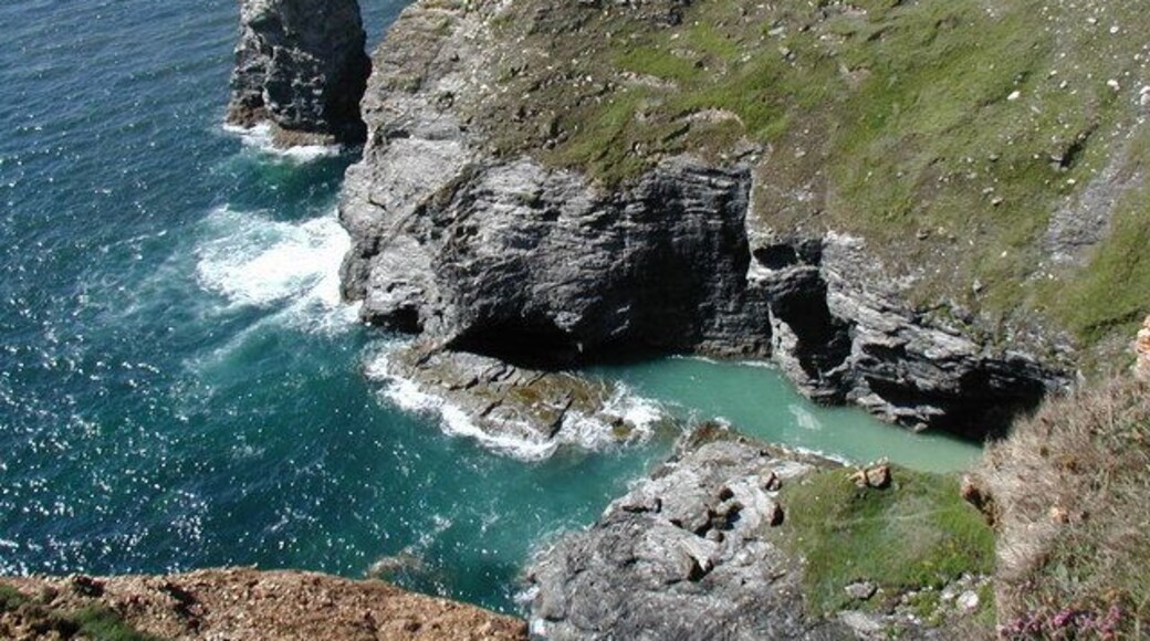 Headland north of Nancekuke Common This photo is taken from the coast path. The Gullyn Rock is shown beyond the headland.