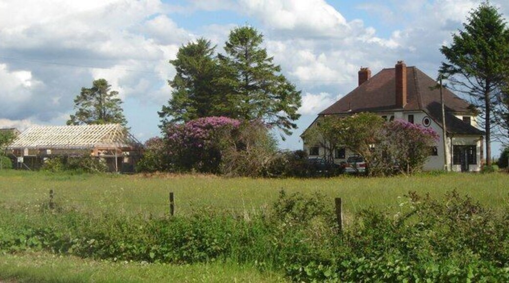 Houses - one being re-built - near Holman Clavel These buildings are close to the cross roads with the B3170.