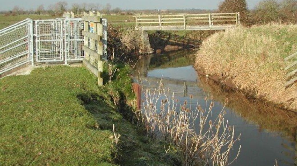 Pilhay Bridge and sluice on Congresbury Yeo river. Pilhay bridge joins the villages of Yatton and Puxton and lies at the end of 'Gang Wall' an ancient walkway over the wetland. The sluices are used to control flooding of the surrounding wetlands which lie below river level. NB: PS reading showed bridge to be 8 feet above MSL.
