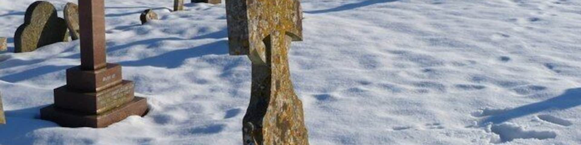 St Michael and All Angels parish churchyard, Quarley, Hampshire, in snow