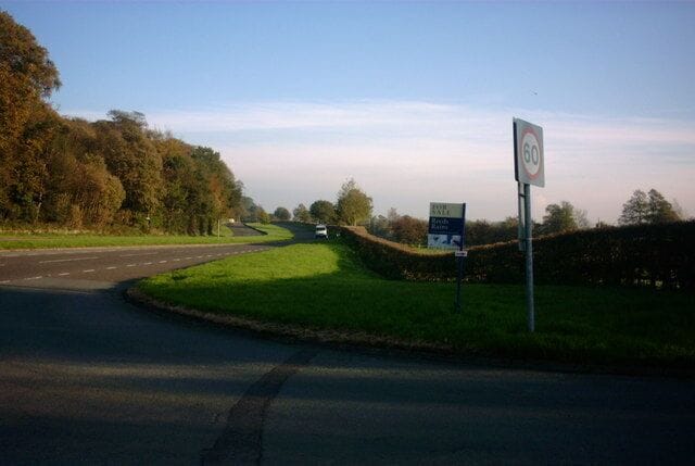 The London Road This view is from a country lane to the tiny village of Salt onto the A51 looking towards Weston. The A51 is also known as the London Road, running from Chester and onwards to London. On the left behind the trees is the Sandon Estate.