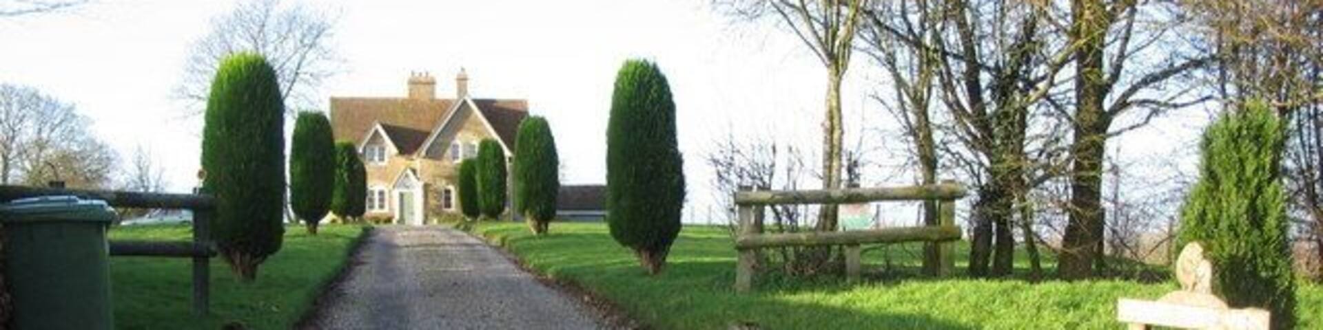 White Highlands House A view looking to the northwest towards White highlands House at Gare Hill. This is a Caravan Club Certificated Location, a basic site for a maximum of five caravans.
