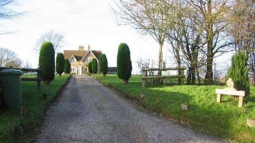 White Highlands House A view looking to the northwest towards White highlands House at Gare Hill. This is a Caravan Club Certificated Location, a basic site for a maximum of five caravans.