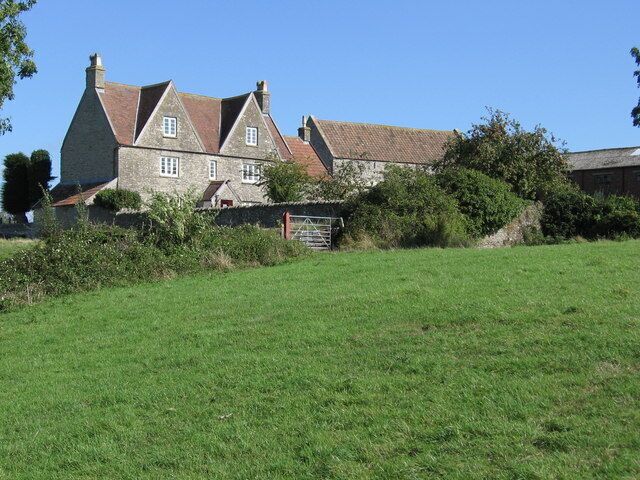 Cliff Farm. There are the working buildings of a farm to the east and north.