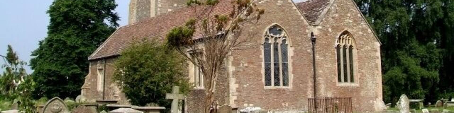 St James the Great, Westerleigh. A gateway from the recreation field to the south of the church into the churchyard, carries the dates "1304 - 2004" - this probably indicates the date of the earliest parts of this church - which I would hazard do not include most of what you see in this picture. The tower in particular looks Victorian to me. What I think is the oldest part of the church can be seen here 464276.