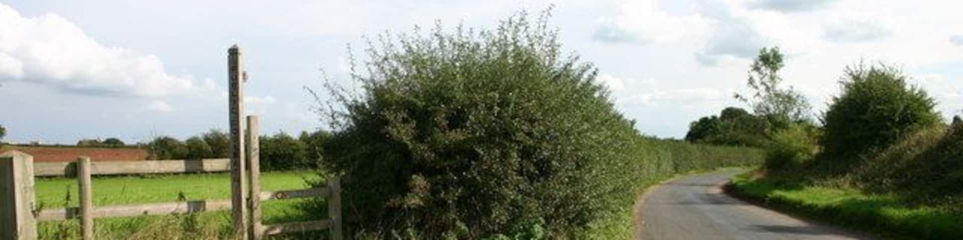 Public footpath and Country Lane. To the left is a public footpath and on the right is Whitgreave Lane, near Stafford. This road is leading to the main A34