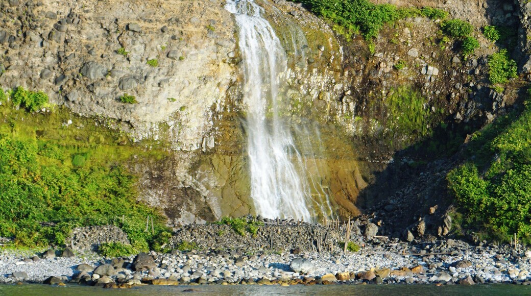 Kamuiwakka Falls and Mount Iō (Shiretoko) in Shari, Hokkaido prefecture, Japan.