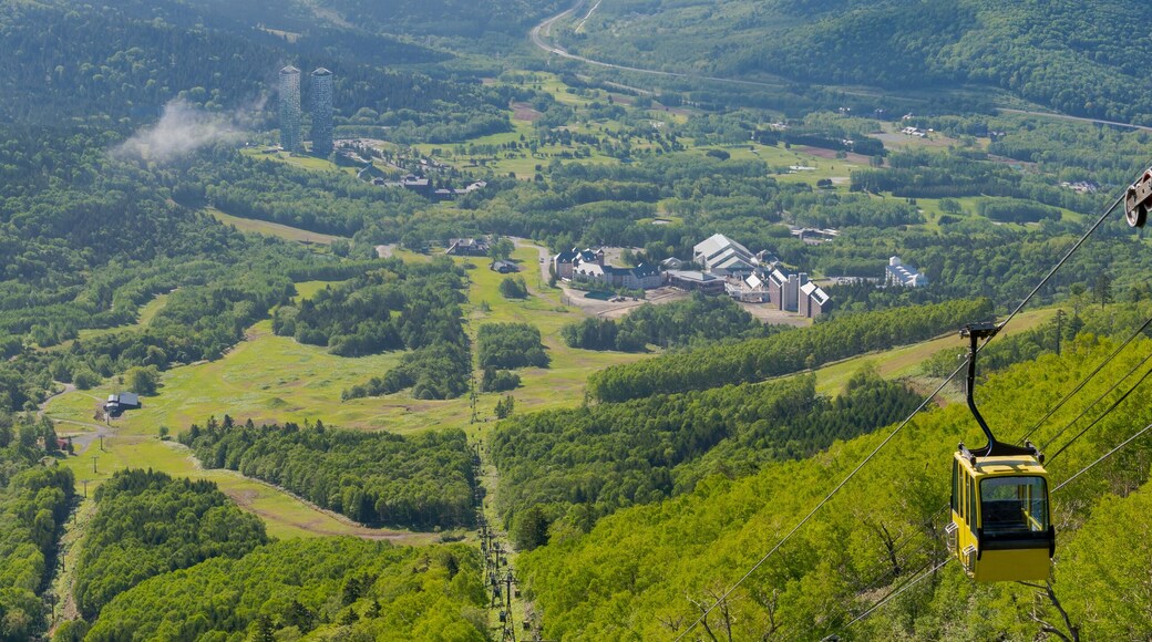 Panorama view from Unkai Terrace in summer time sunny day. Take the cable car at Tomamu Hoshino Resorts, going up to see the sea of clouds. Shimukappu village, Hokkaido, Japan