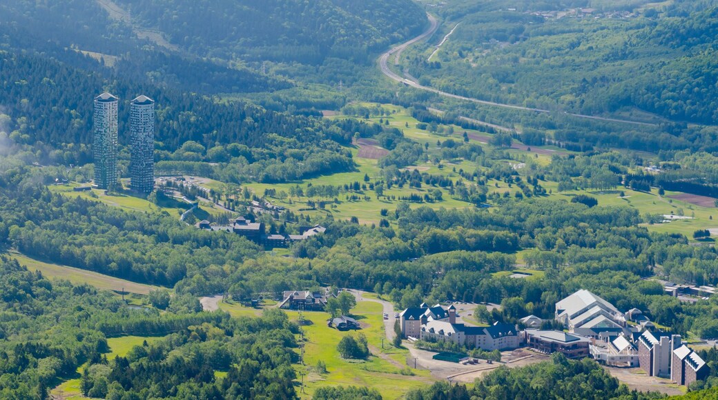 Panorama view from Unkai Terrace in summer time sunny day. Take the cable car at Tomamu Hoshino Resorts, going up to see the sea of clouds. Shimukappu village, Hokkaido, Japan