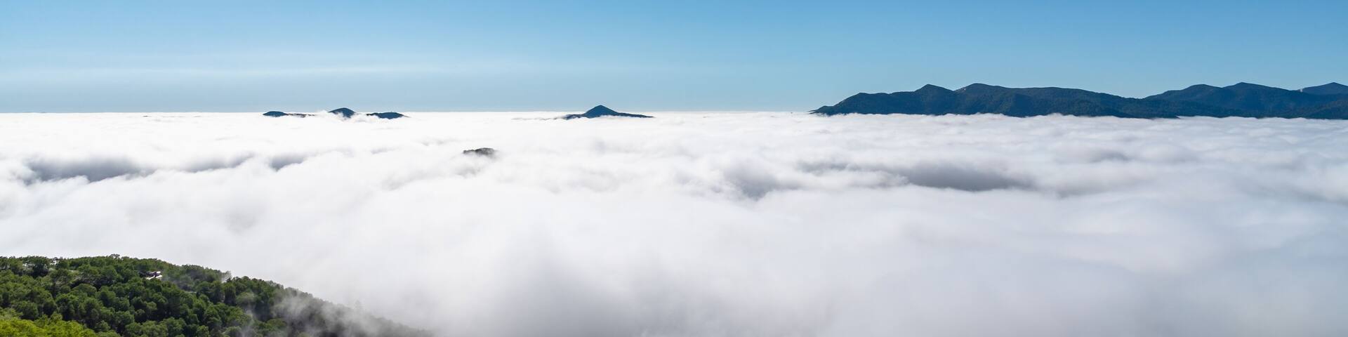 Panorama view from Unkai Terrace in summer time sunny day. Take the cable car at Tomamu Hoshino Resorts, going up to see the sea of clouds. Shimukappu village, Hokkaido, Japan
