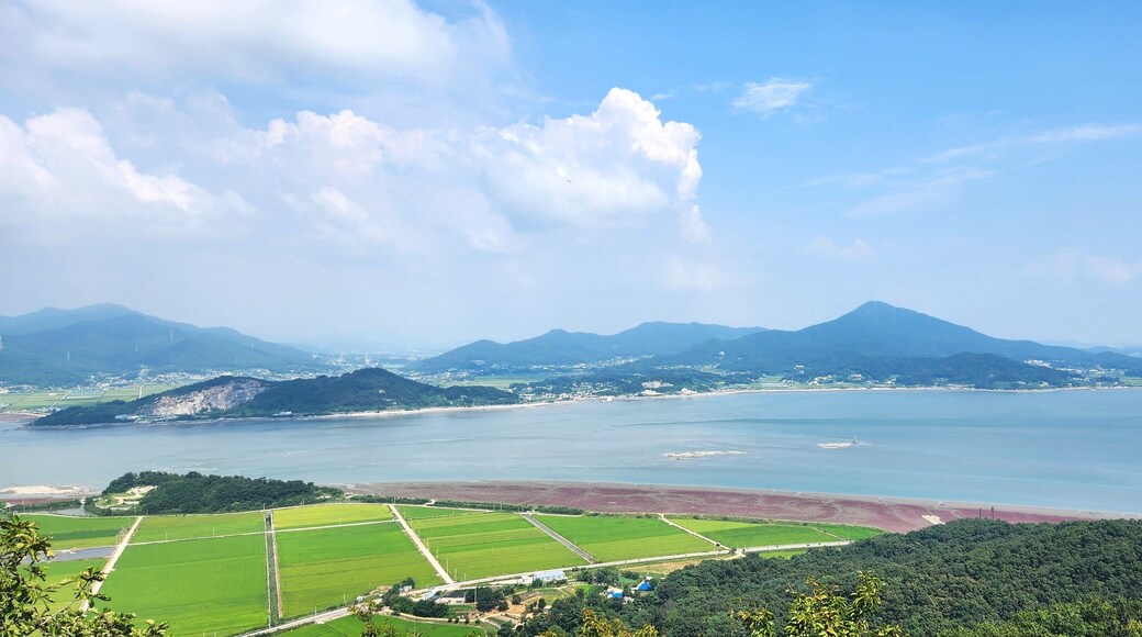 the top of Haemyungsan Mountain in Korea in sunny weather. hiking in korea. mountains Korea Seoul. View from the top of the mountain to the sea. island in Korea. Seokmodo Island Korea