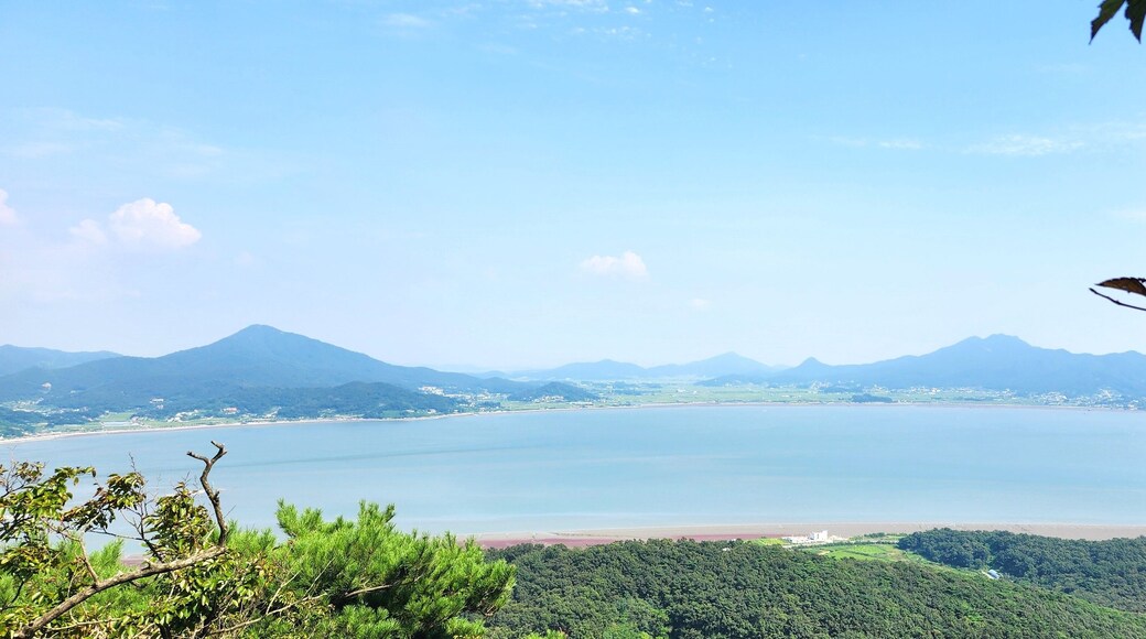 the top of Haemyungsan Mountain in Korea in sunny weather. hiking in korea. mountains Korea Seoul. View from the top of the mountain to the sea. island in Korea. Seokmodo Island Korea