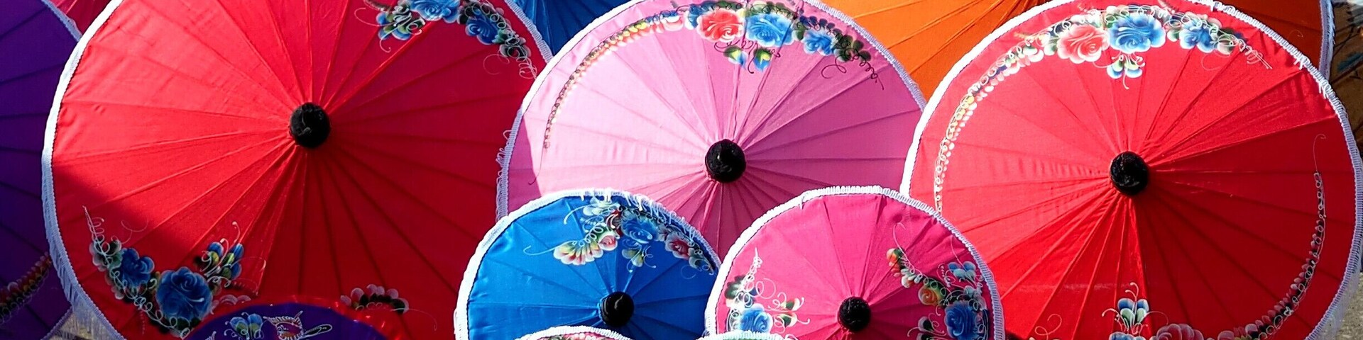 Borsang (or Bosang) is the town where the traditional paper umbrellas are made. You can watch folks while they manufacture these creations, order your personalized umbrella made of paper, silk or cotton, painted with your own design.