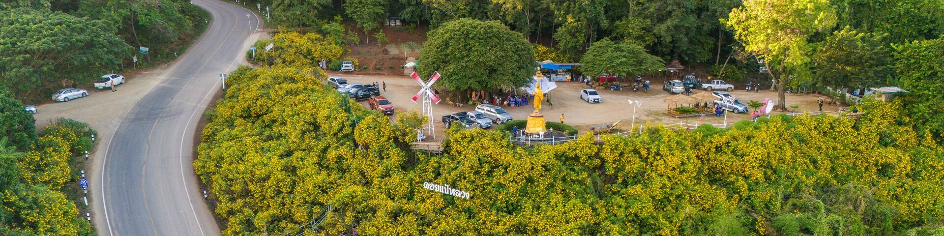 Tourist visiting Doi Pae Luang hill an iconic viewing point in Phaya Mengrai District in Chiang Rai province of Thailand.