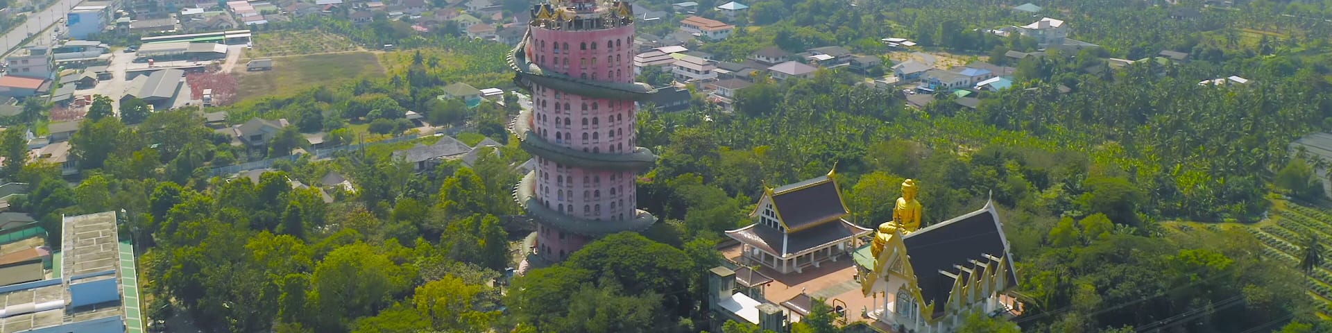 Aerial view of Wat Samphran or Chinese Dragon Temple in Sam Phran District in Nakhon Pathom province near Bangkok Urban City, Thailand. Tourist attraction landmark in travel trip concept.