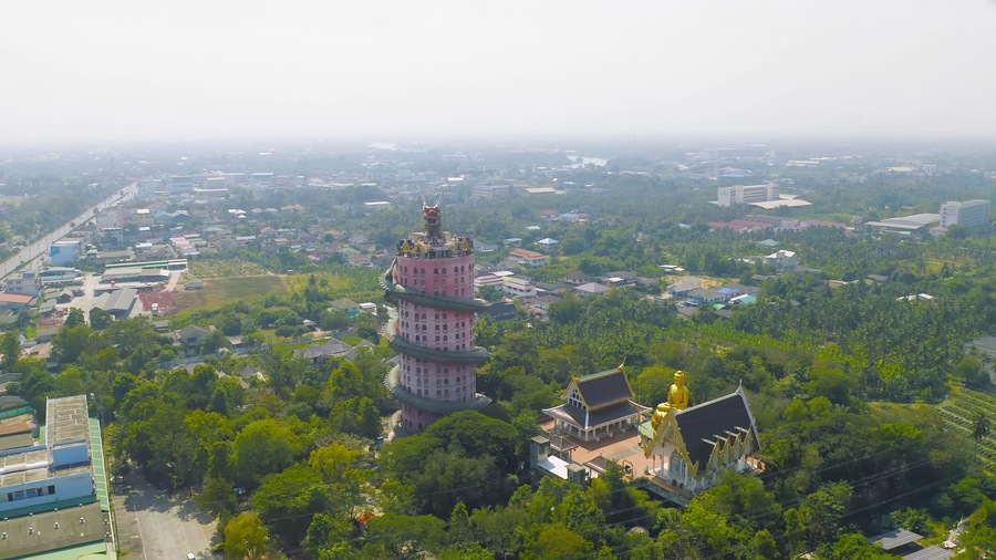 Aerial view of Wat Samphran or Chinese Dragon Temple in Sam Phran District in Nakhon Pathom province near Bangkok Urban City, Thailand. Tourist attraction landmark in travel trip concept.