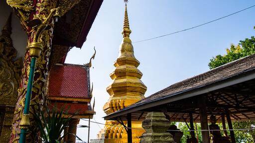 Golden pagoda in Phrathat Chom Sin temple
