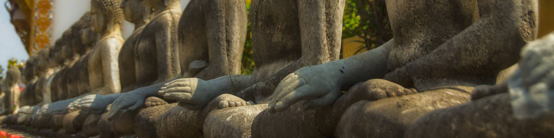 Row of Stone Buddhas at Phrathat Doi Ha Chedi, Si Don Chai, Chiang Khong District, Chiang Rai