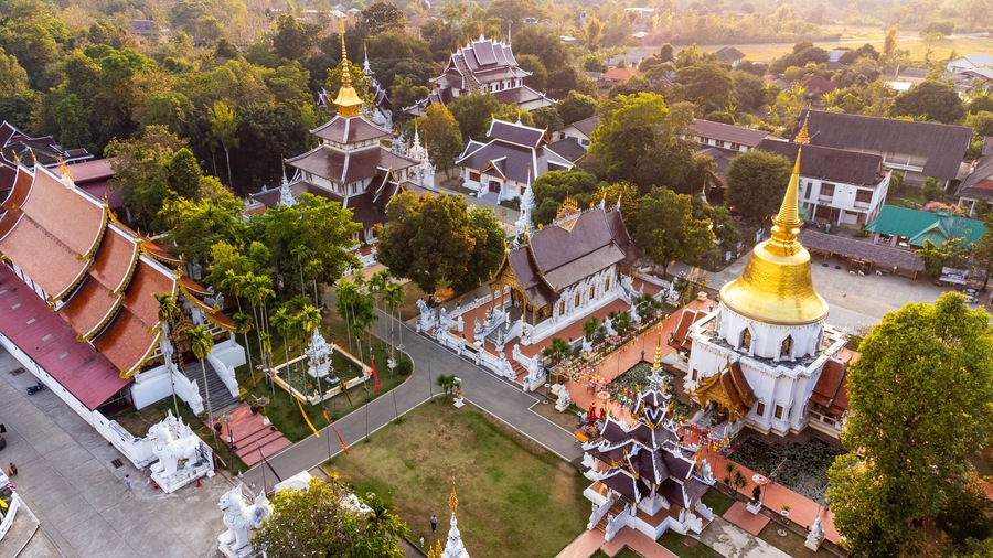 Wat Pa Dara Phirom Phra Aram Luang temple complex shining in golden hour light, Mae Rim, Thailand