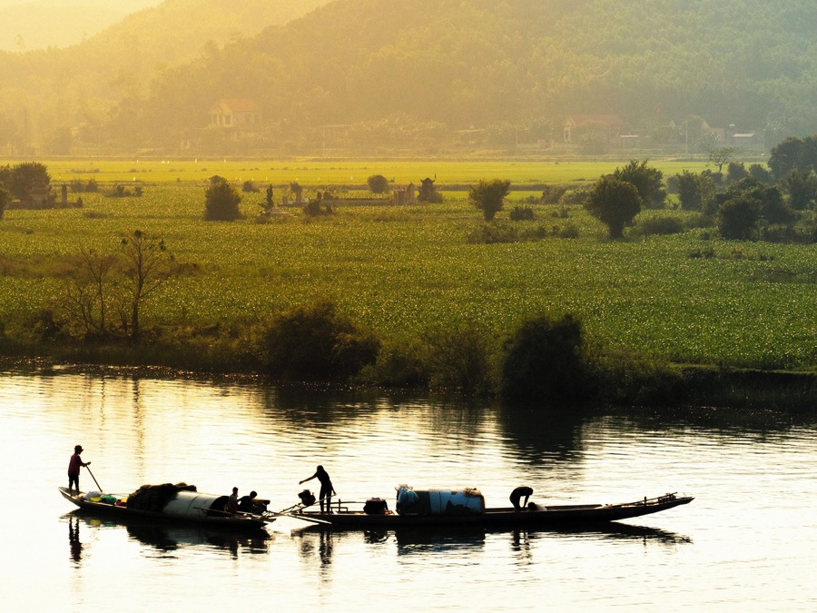 Morning shot taken from a moving train traveling north from south in Vietnam