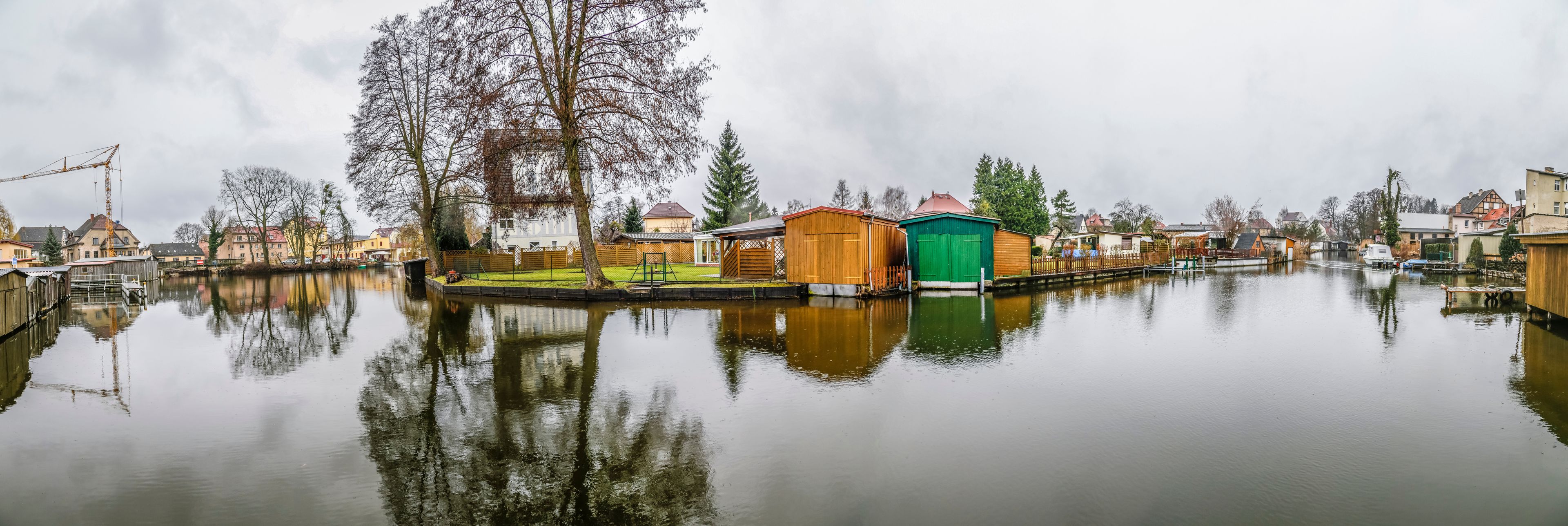 small village at the river Havel with private piers and huts in former east Germany