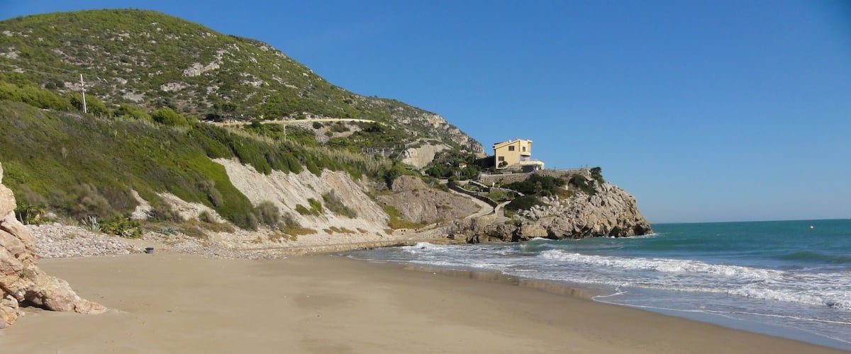 This is a a photo of a beach in Catalonia, Spain, with id: