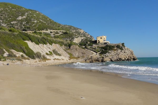 This is a a photo of a beach in Catalonia, Spain, with id: