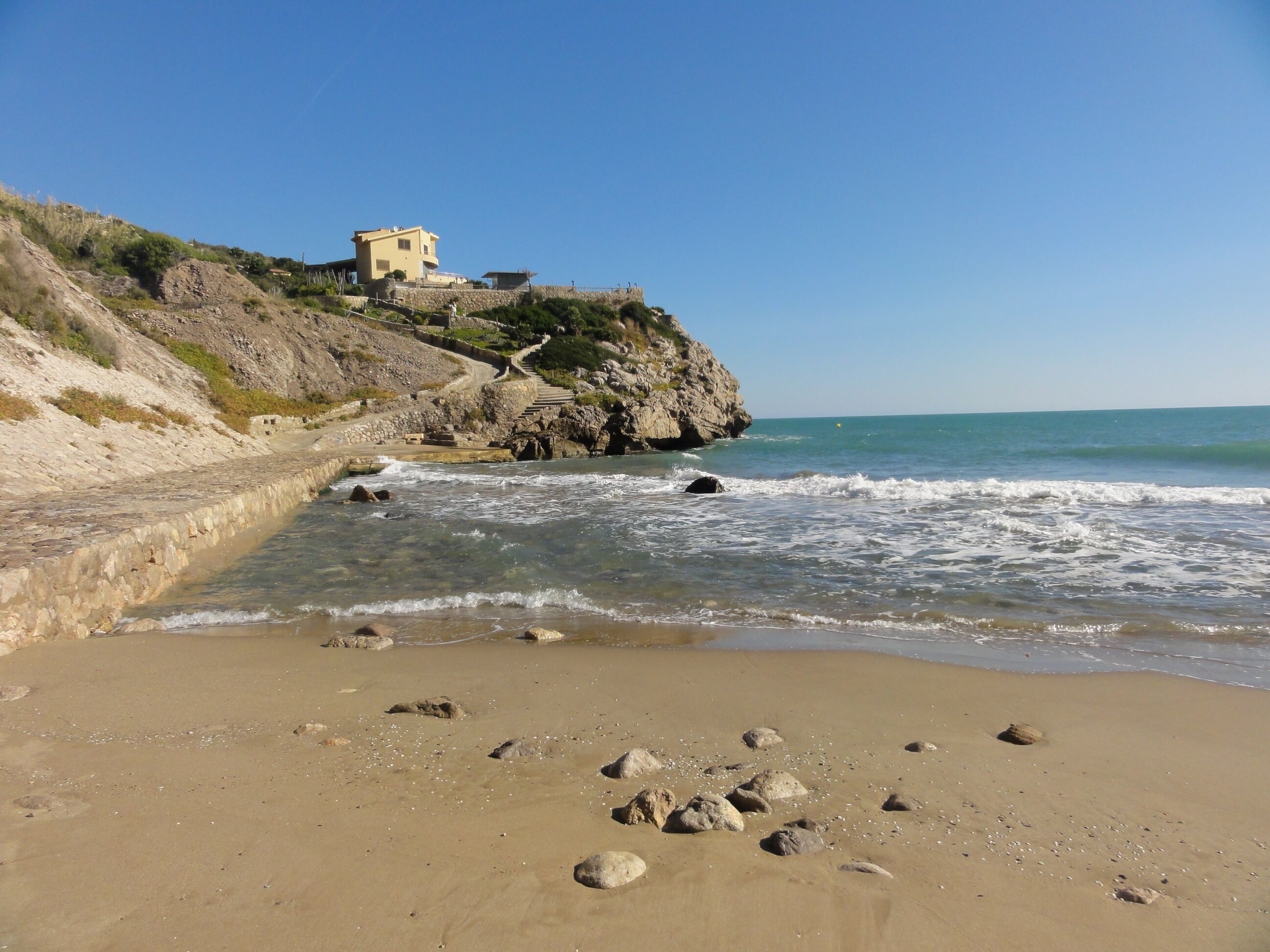 This is a a photo of a beach in Catalonia, Spain, with id: