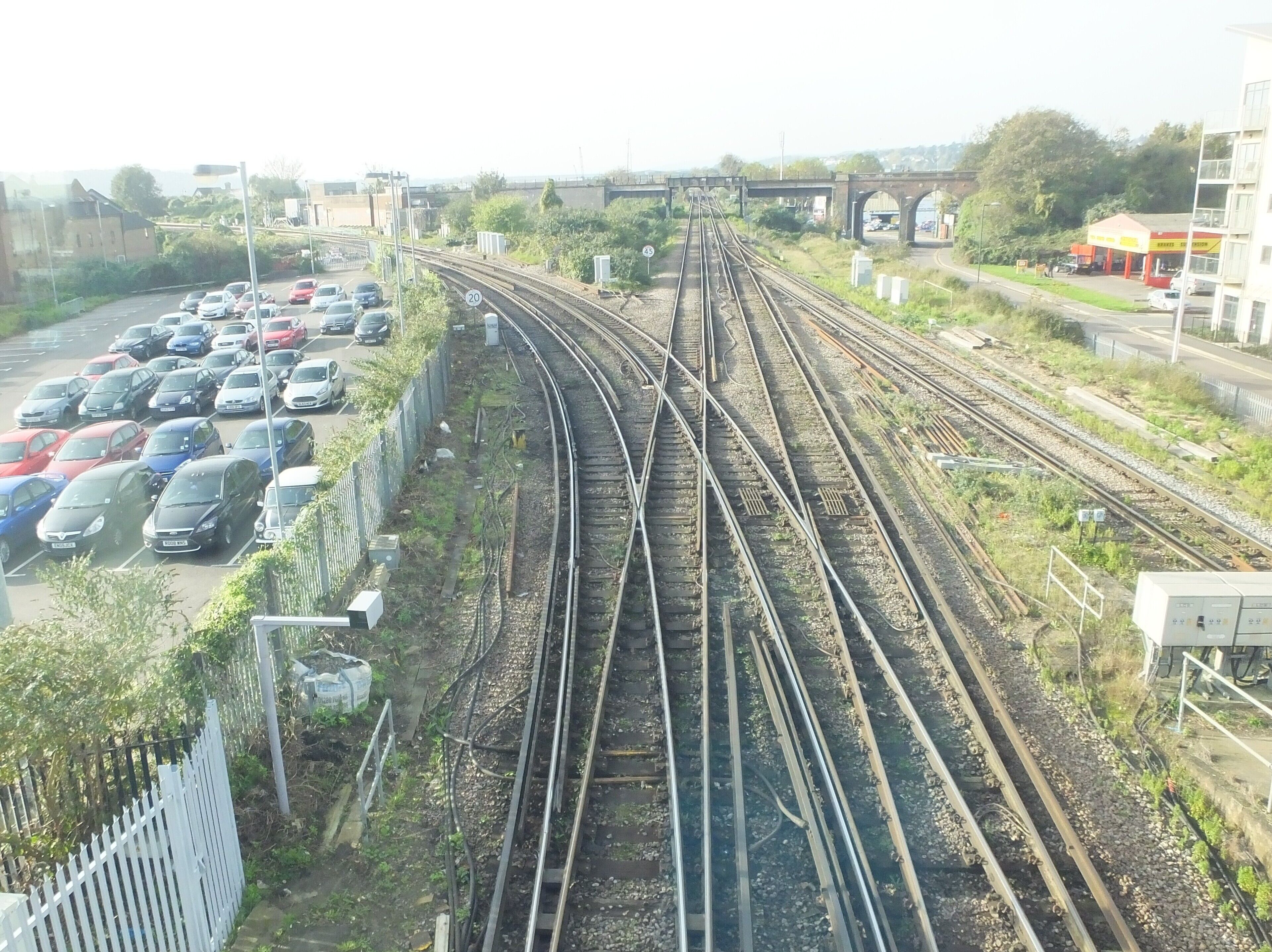 Strood railway station 2014 after the completion of the lifts and pedestrian overbridge. Line pattern down from the overbridge- taken through glass.