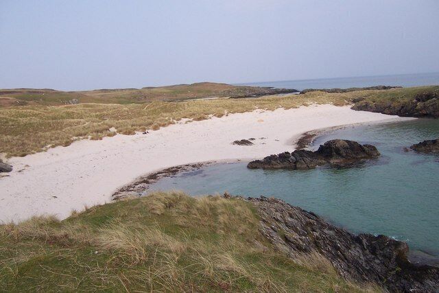 Cable Bay. The twin arcs and singing sands of Cable Bay on a pleasant May afternoon