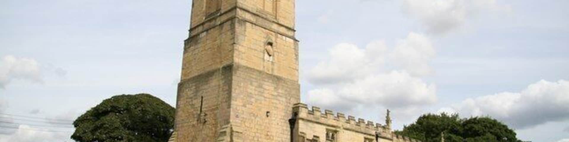 St.Peter's church Norman tower with 15th century top and crenelation all round