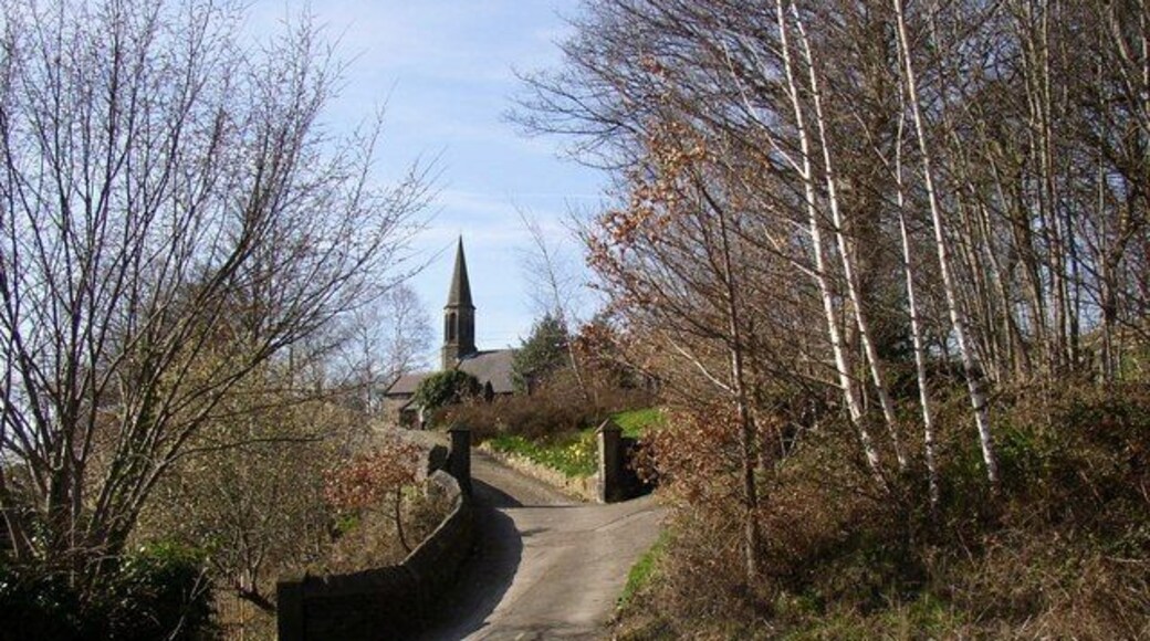 The approach to the church, Brockholes St George's church is built on The Rock, and the way to it is along the lane past the National School and then up a drive between gateposts like those for a Victorian house.