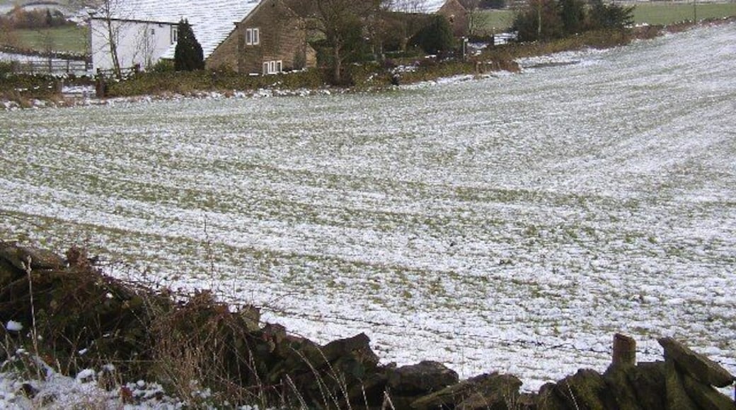 Height, Thurstonland. This farm is at 260m AOD, so the name is appropriate. The area around it is called Height Green. The building on the right has a clock in the gable, not as clear on the photo as I had hoped for. St Thomas's Church, Thurstonland village, is in the background.