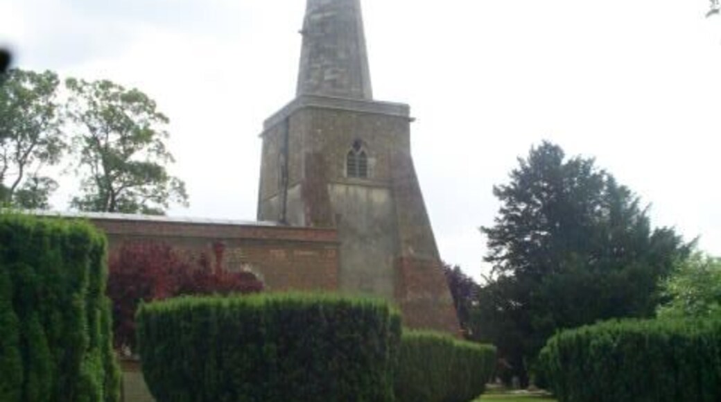 St Mary's Church, Connington Clipped yews are a feature of this fenland church.